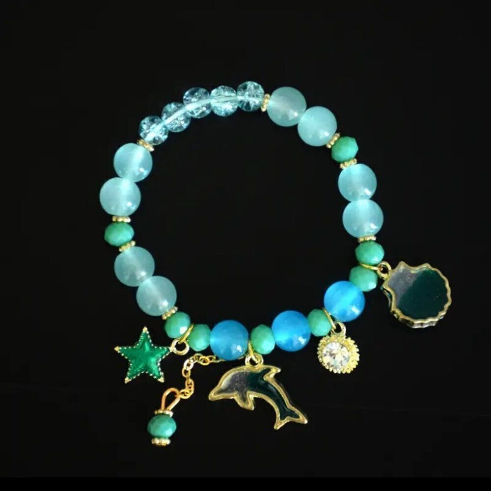 Ocean Theme Elastic Beaded Bracelet with Dolphin, Starfish, and Shell Charms